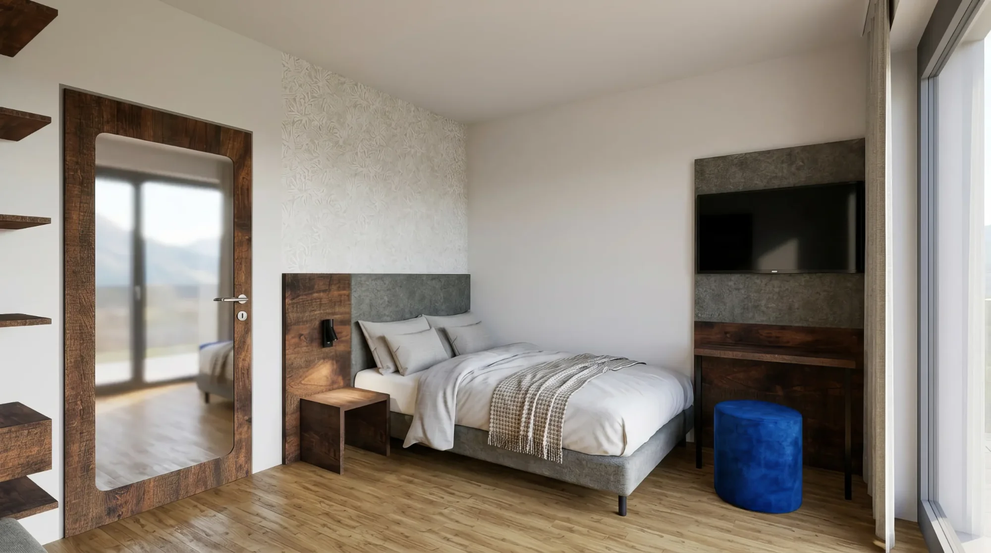 Modernes Schlafzimmer mit Holzboden, grauem Doppelbett, TV, Spiegelwand und blauer Sitzgelegenheit.